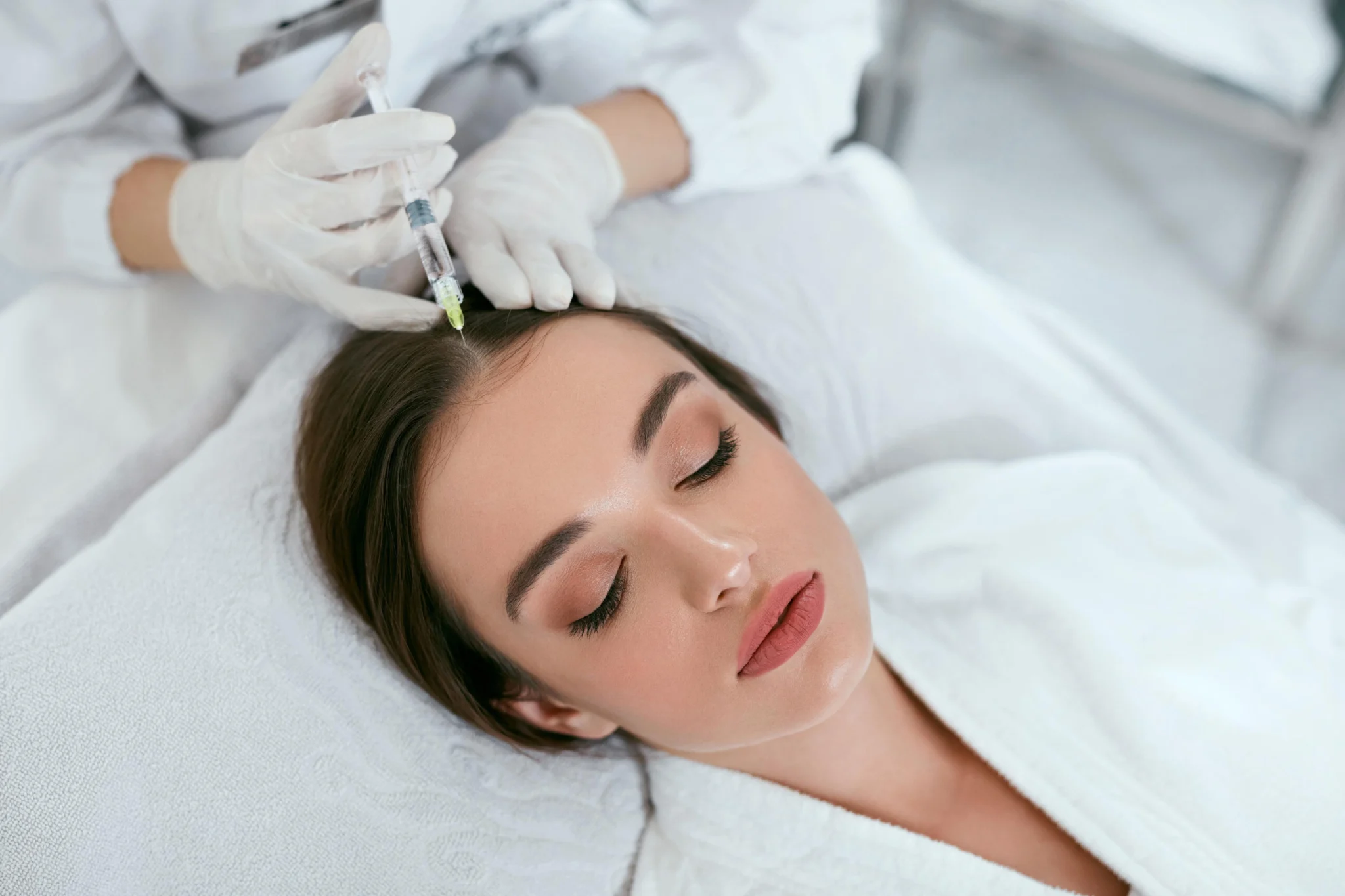 Lady getting Exosome Therapy for Hair rejuvenation at Eluxir MD in Chesapeake, VA
