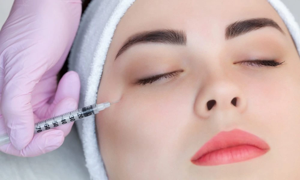 Lady receiving botox treatment at Eluxir MD in Chesapeake, VA